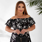 Plus size dress in black floral, side detail — sharm