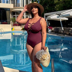 Plus size one-piece swimsuit in chocolate, side pose at pool — sharm