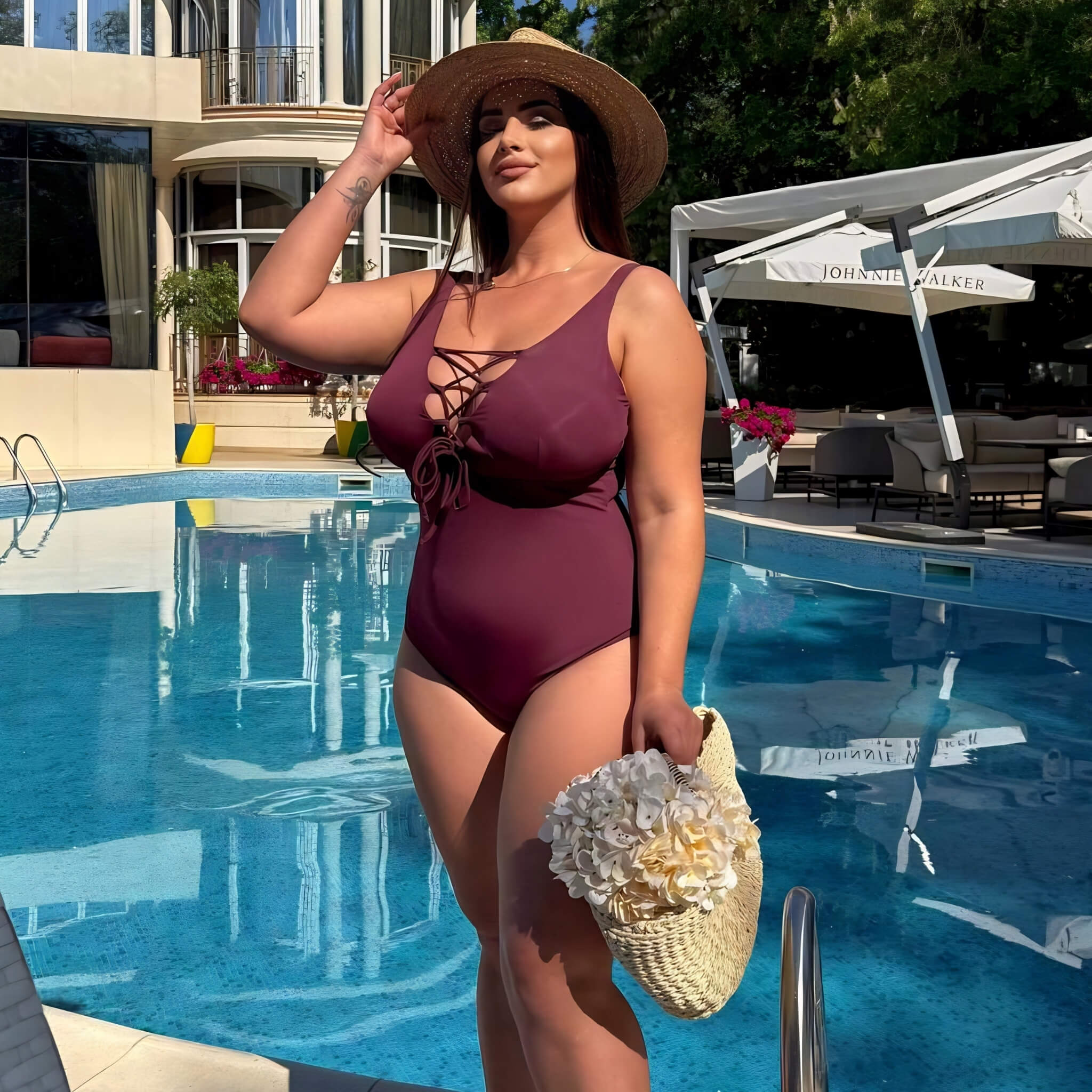 Plus size one-piece swimsuit in chocolate, side pose at pool — sharm
