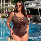 Plus size one-piece swimsuit in brown, front view on model — sharm