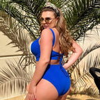 Plus size swimsuit in blue, back view showing lattice cross-back straps — sharm