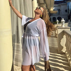 Plus size sheer kimono in white, three-quarter view at outdoor stairs — sharm
